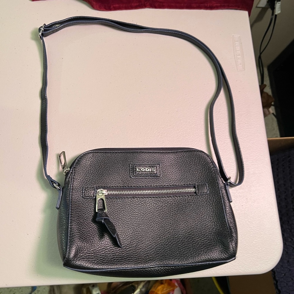 Lodis black, soft leather Crossbody with zipper compartment on the outside